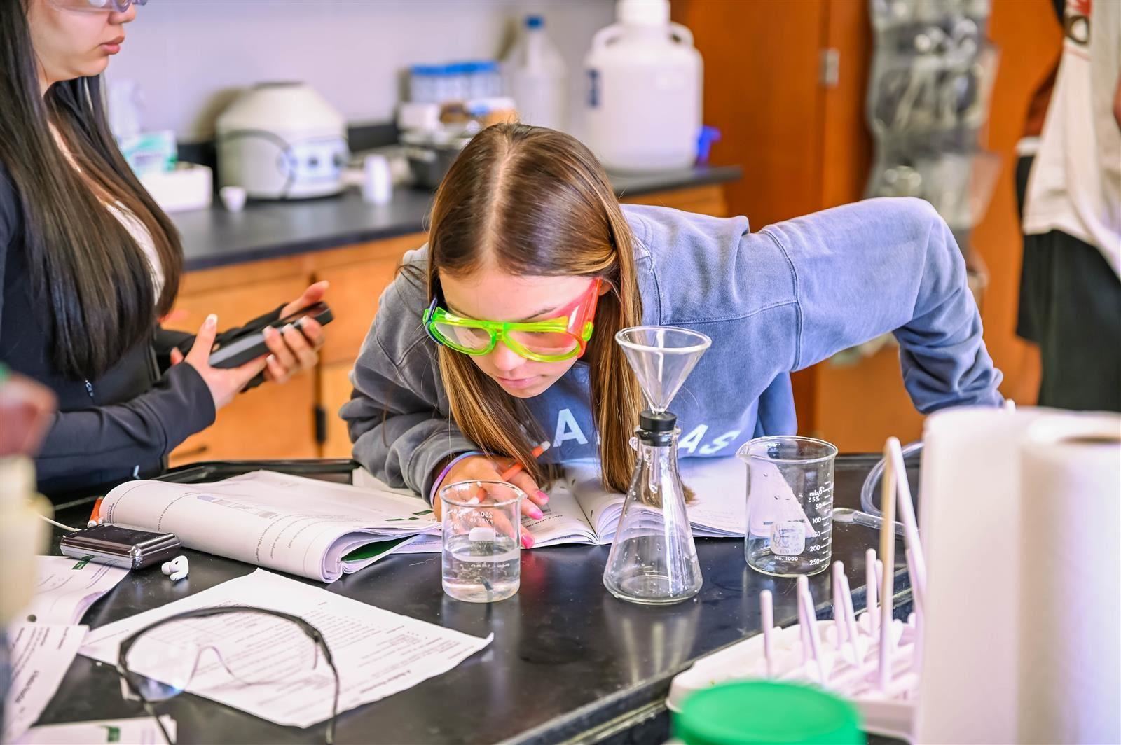 female student in science lab